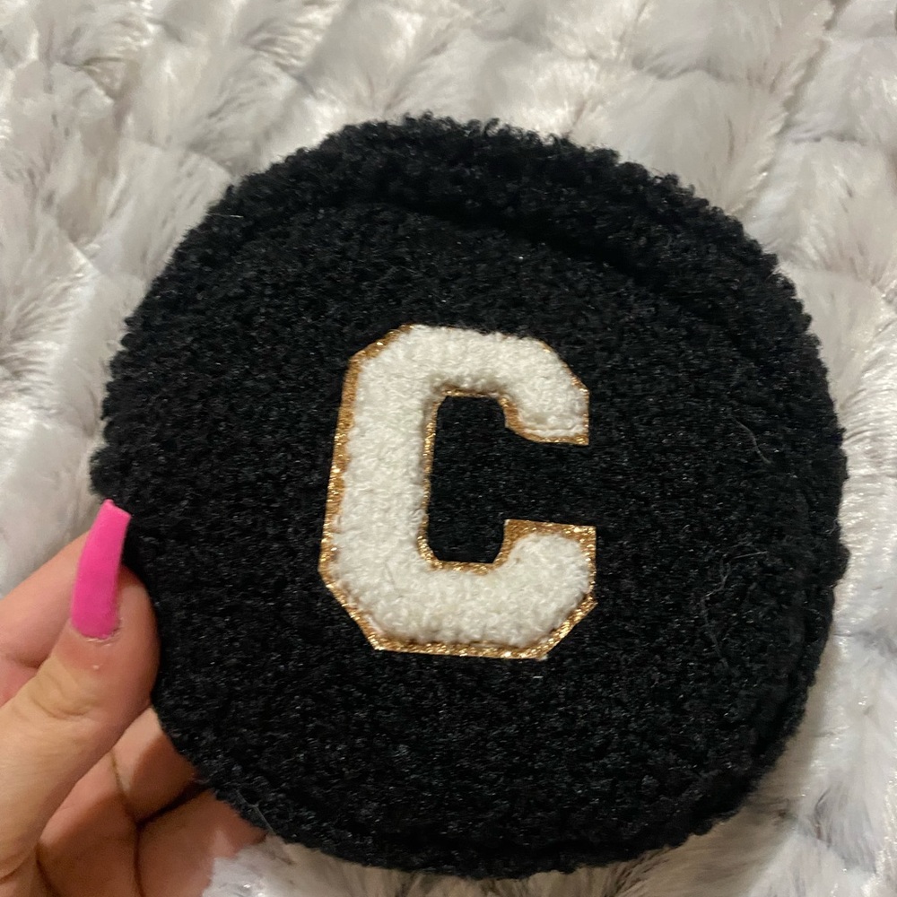 Black Round Pouch with White 'C' Patch